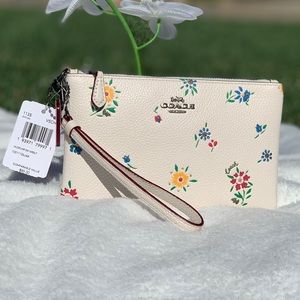 Coach Wristlet with wildflower print